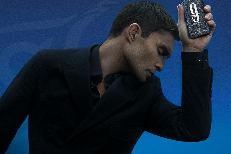 Ed Westwick holding 9PM Night Out